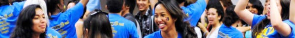 Students wear blue UCR shirts in an on-campus group activity